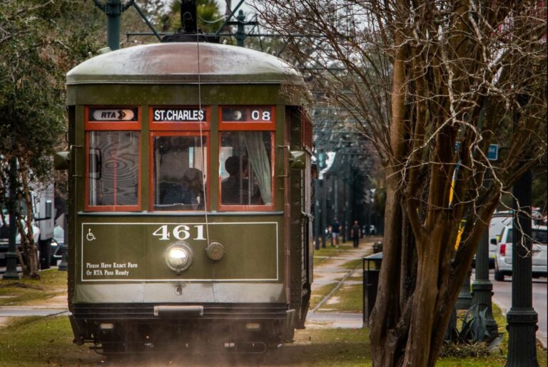 the st charles trolley surrounded by trees